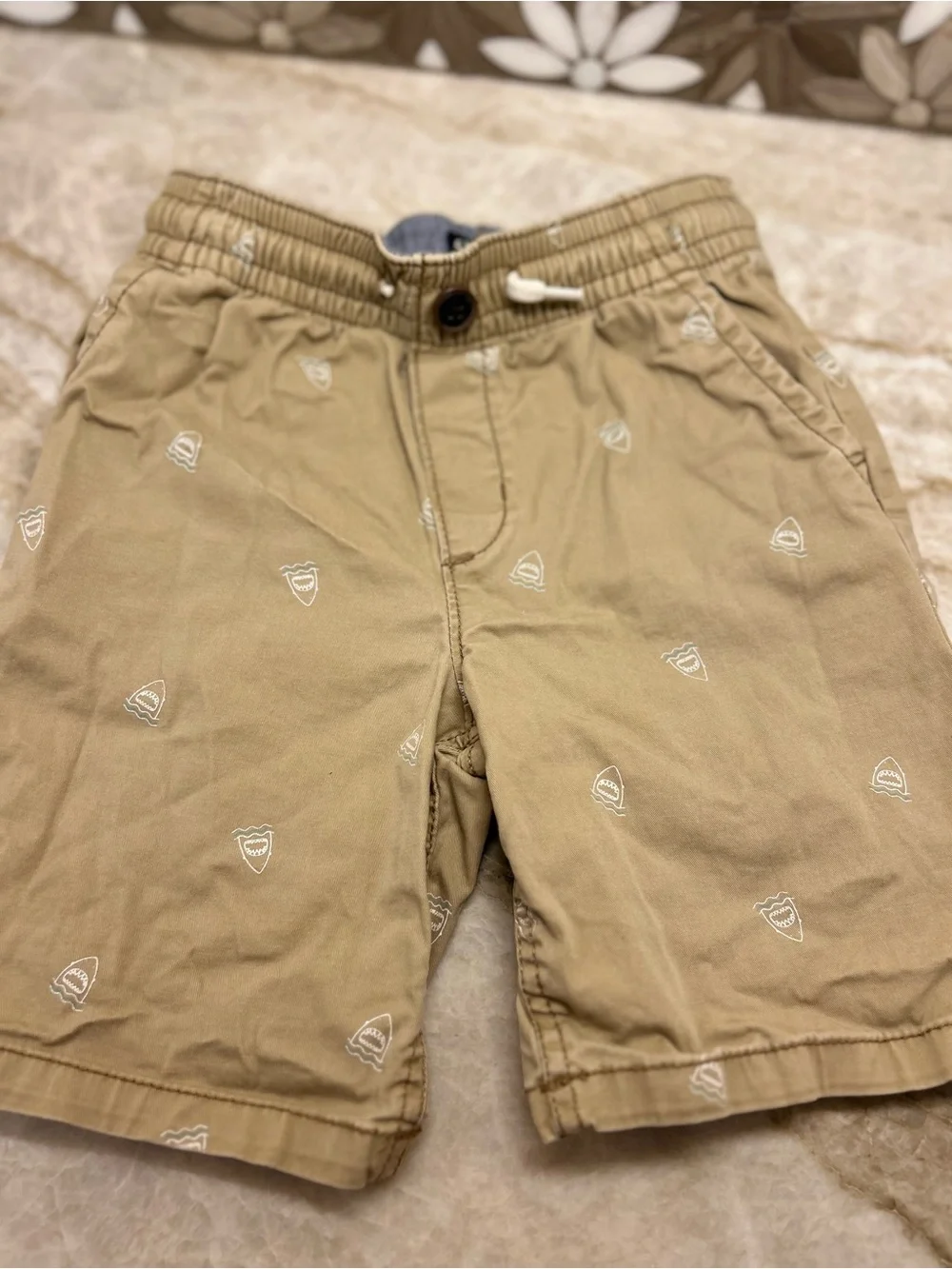 OshKosh B'gosh Tan Shorts with Small White Embroidered Icons